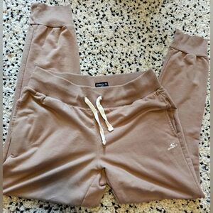 O'Neill brand. Tan joggers. Size medium. Elastic waist. Ribbed cuffs.